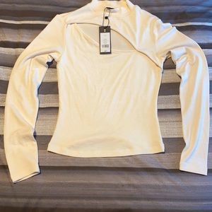 Long sleeve shirt with front slit